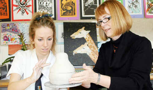 Year 11 student Samantha Fulton-Kennedy works with art teacher Betty Shannon. Year 11 student Samantha Fulton-Kennedy works with art teacher Betty Shannon.